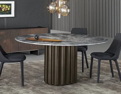 Tavolo Dorian Table con top in marmo e base in poliuretano finitura bronzo spazzolato di Bonaldo